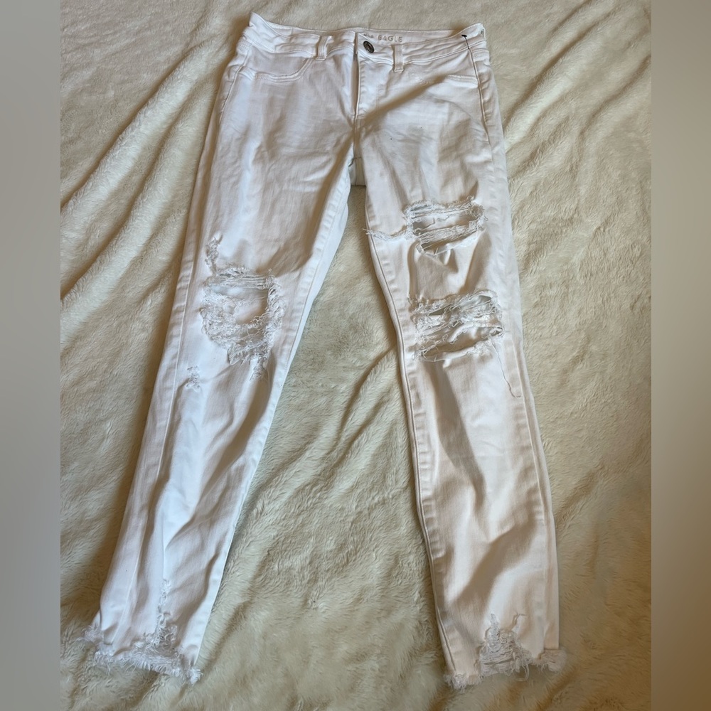 Women’s white ripped jeans